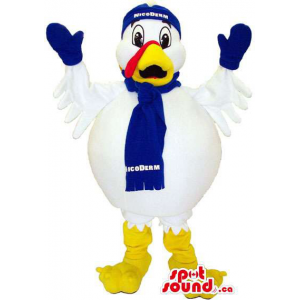 White Large Bird Mascot Dressed In A Winter Scarf And Hat
