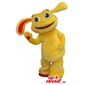 Criatura amarela da mascote...