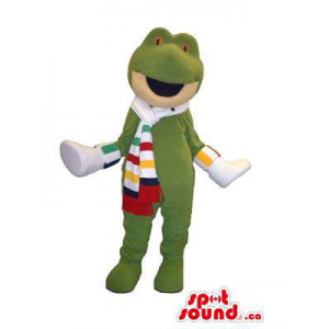 Green Frog Animal Mascot Dressed In A Striped Scarf And Shoes