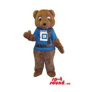 Brown Teddy Bear Plush Animal Mascot Dressed In A Blue T-Shirt